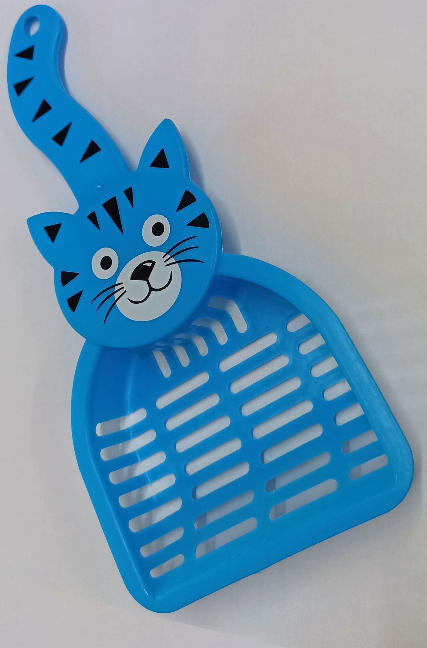 A blue plastic cat litter scoop